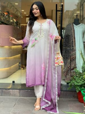 The outfit consists of a long flowing kurta a matching bottom and a sheer dupatta