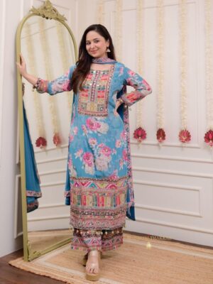 The shows a beautiful colorful Indian outfit